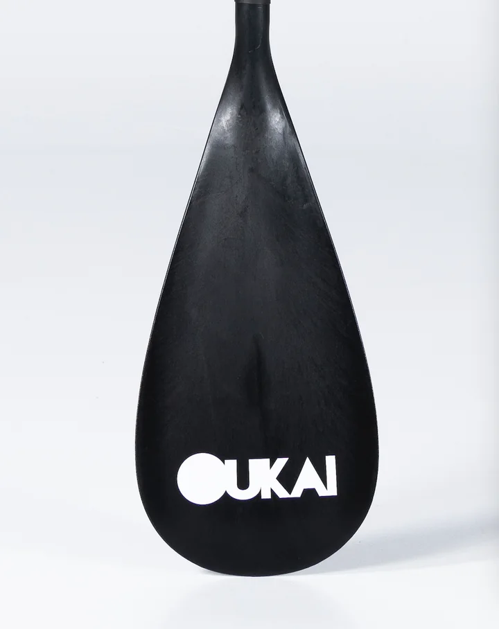 Black paddle blade with a white OUKAI logo near the tip
